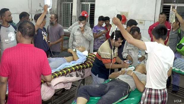 Chinese power plant workers injured in a fight with Bangladeshi work mates are treated at Sher-e-Bangla Medical College Hospital in Barisal, Bangladesh, June 19, 2019 (Photo: RFA)